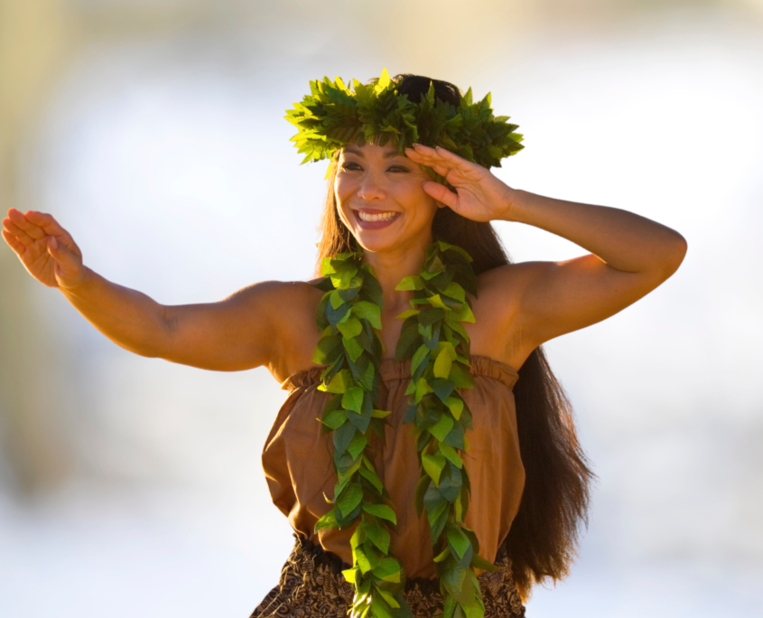 Hula dancer with maile lei and haku