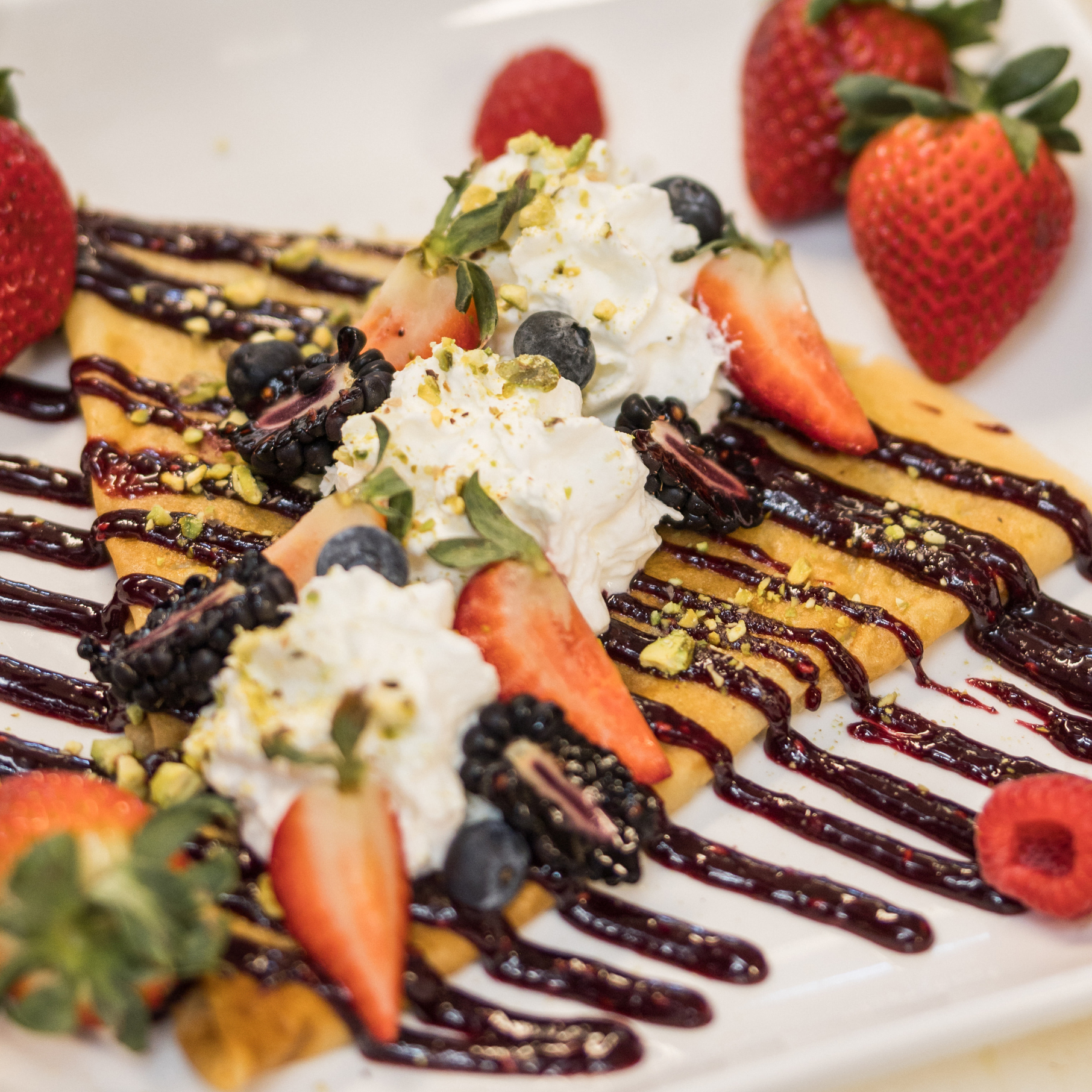 Crepe with chocolate and strawberries